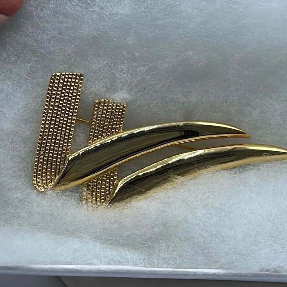 Vintage Casual Corner Art Deco styled textured and smooth brooch gold tone
